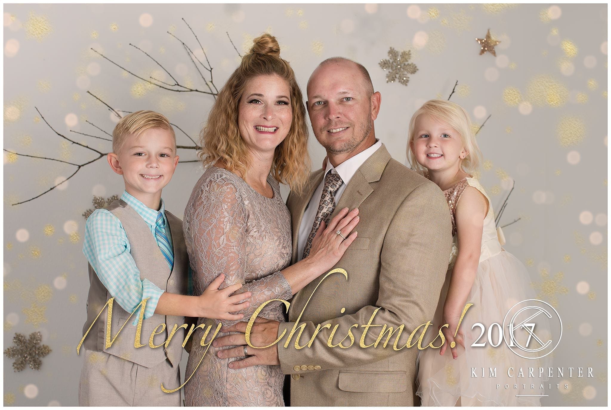 A family portrait that is Christmas themed.