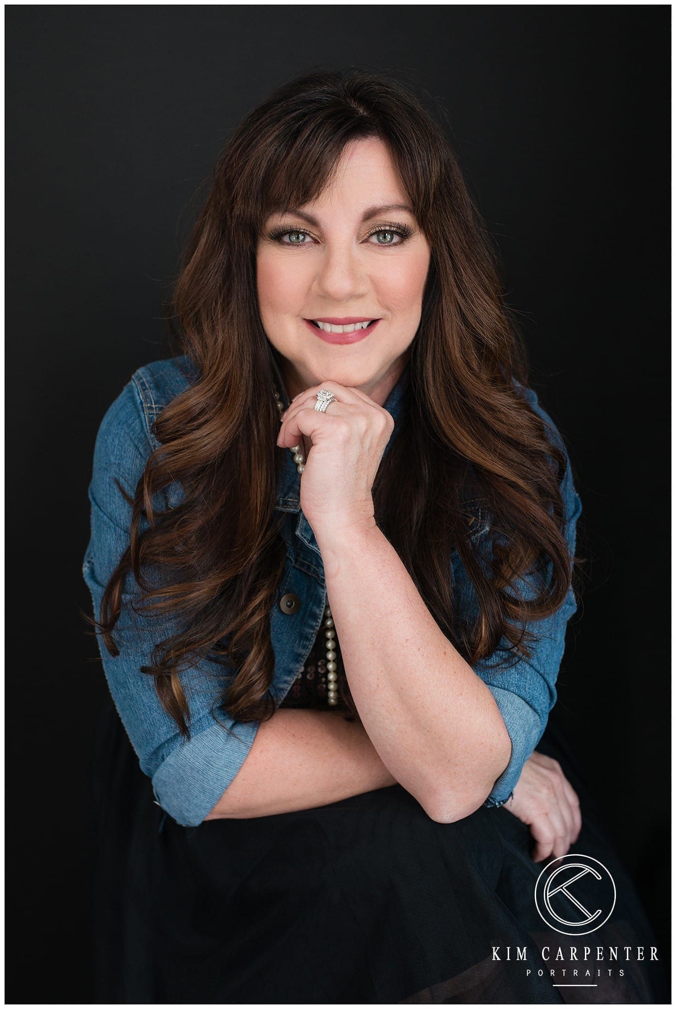 Lakeland photographer captures photograph of woman wearing blue with brown hair. 