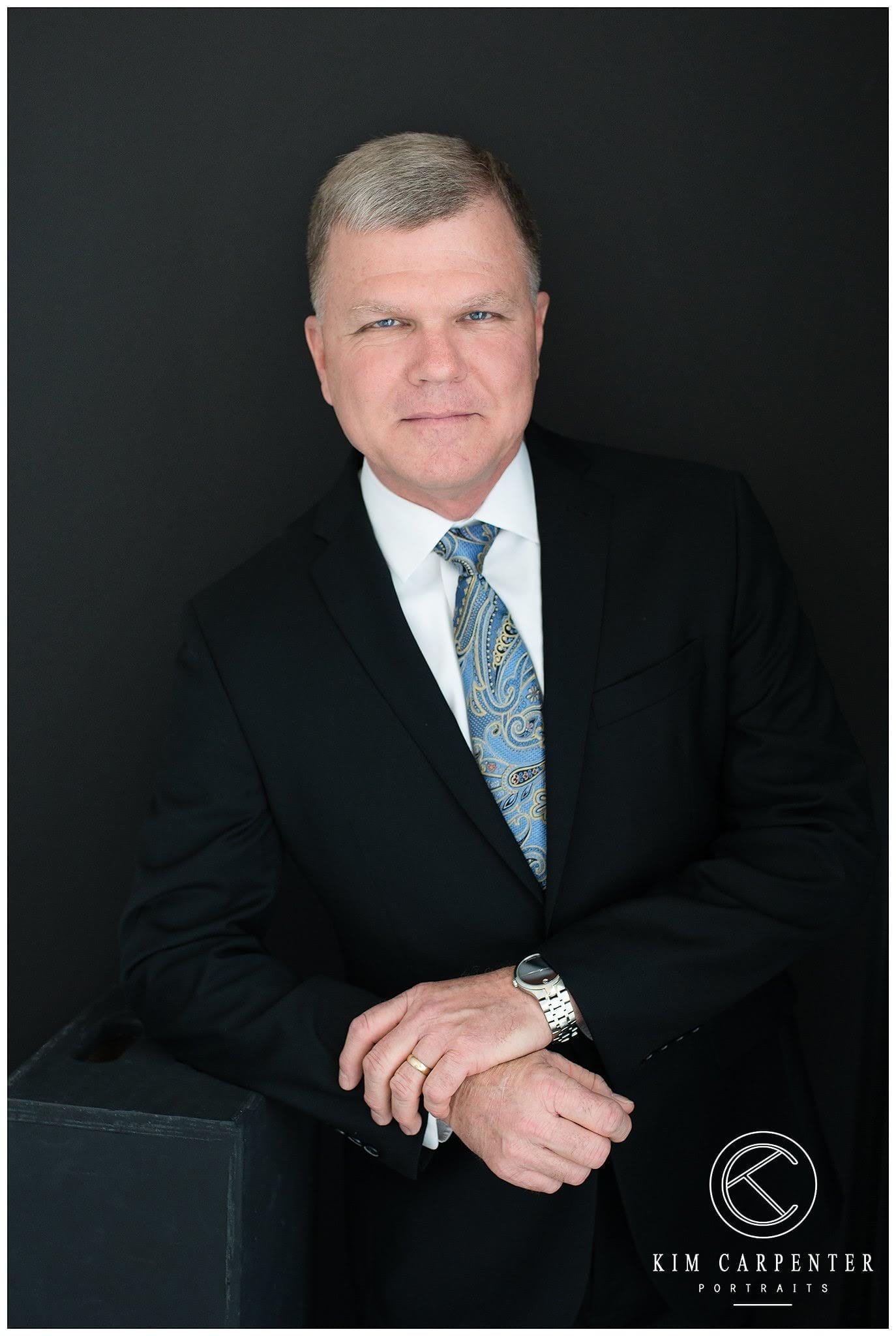 Professional headshots of a licensed insurance agent.